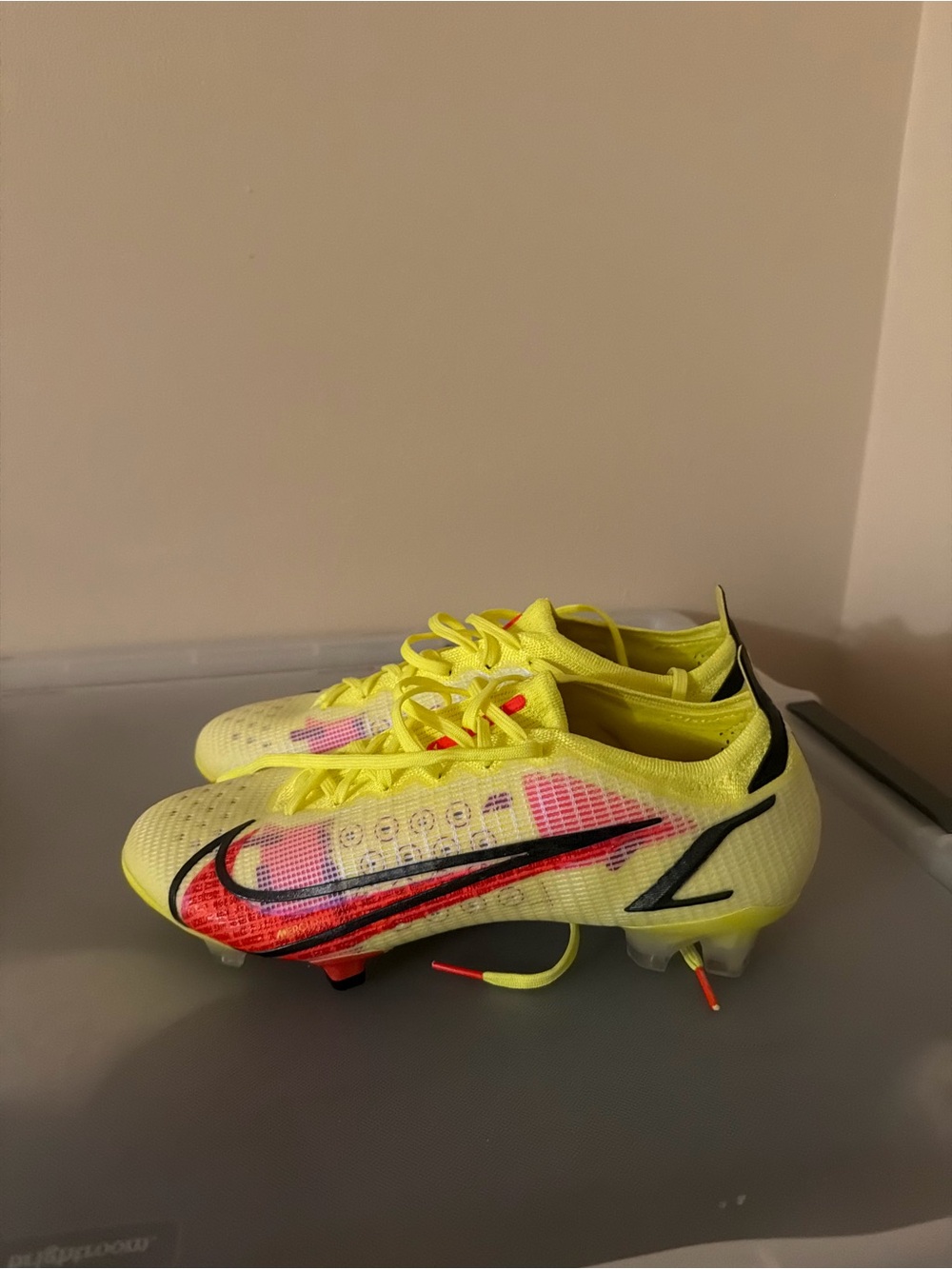 Nike Neon Yellow Soccer Cleats with Pink and Black Accents